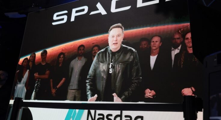 Elon Musk, founder and CEO of SpaceX, speaks via video before the ringing of opening bell at the Nasdaq Marketsite at the launch of the company's initial public offering (IPO) on June 12, 2026