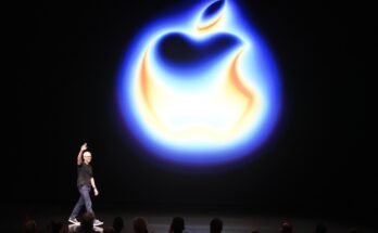 Apple CEO Tim Cook attends a product launch event.