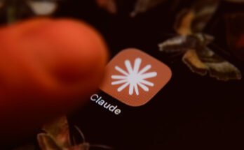 The Claude app icon is displayed on a smartphone screen