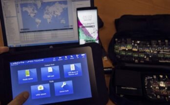 An engineer shows devices and explains the technology developed by the Israeli firm Cellebrite.