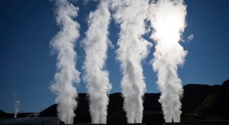 Steam rises from a geothermal power plant in Iceland.