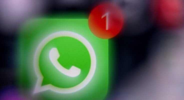 This illustration photograph taken on December 1, 2025, shows the logo of US instant messaging software Whatsapp displayed on a smartphone's screen.